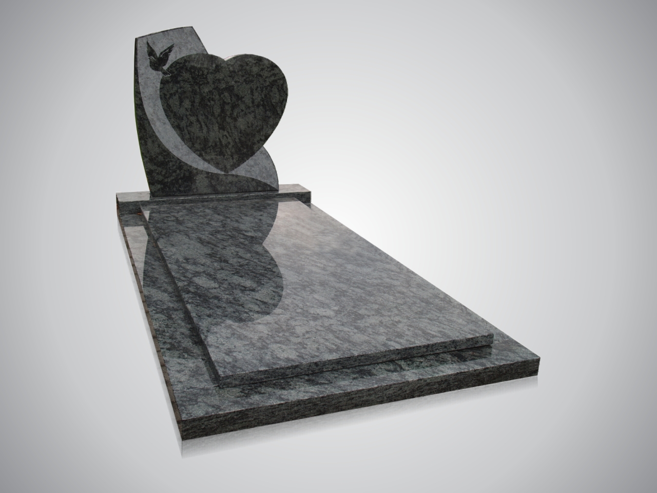 Familiegrafsteen met hartvorm en vogelgravure op begraafplaats De Hoflaan in Zoetermeer